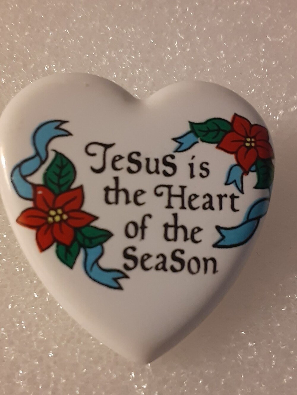 Heart-Shaped Holiday Keepsake Pin 1994- White with Red Poinsettias